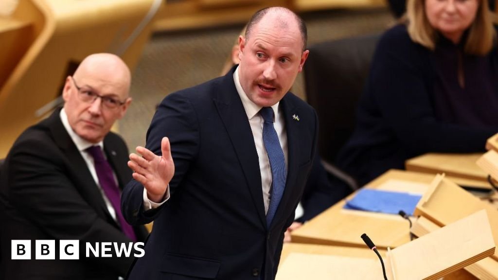 Neil Gray 'sorry' after chauffeur trips to football