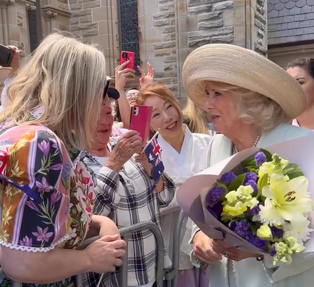 Queen Camilla grants a Royal Warrant to her wedding dress designer