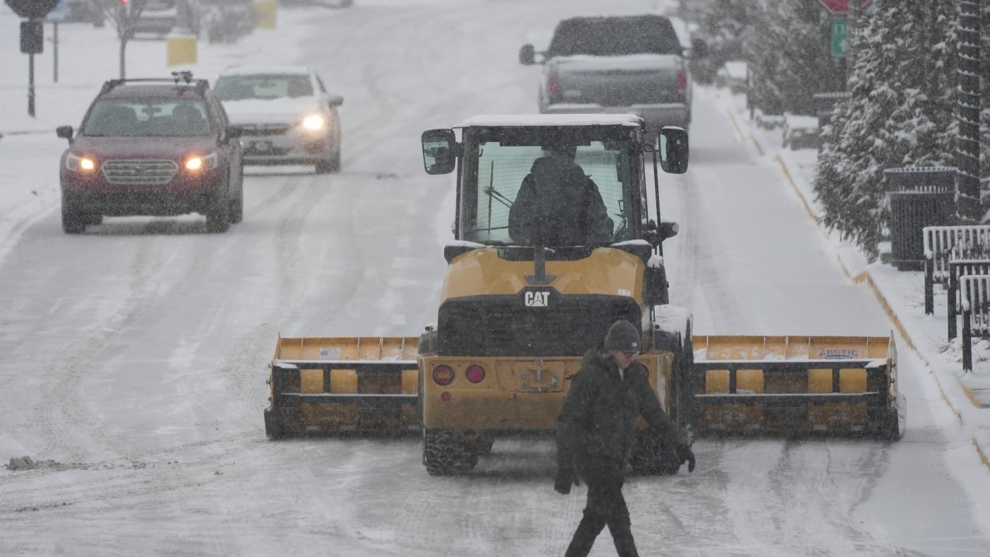 Snowstorms close schools, offices across a large part of the U.S. : NPR