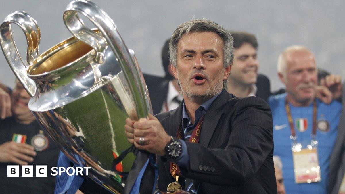 Jose Mourinho holds the Champions League trophy after beating Bayern Munich 2-0 in 2010