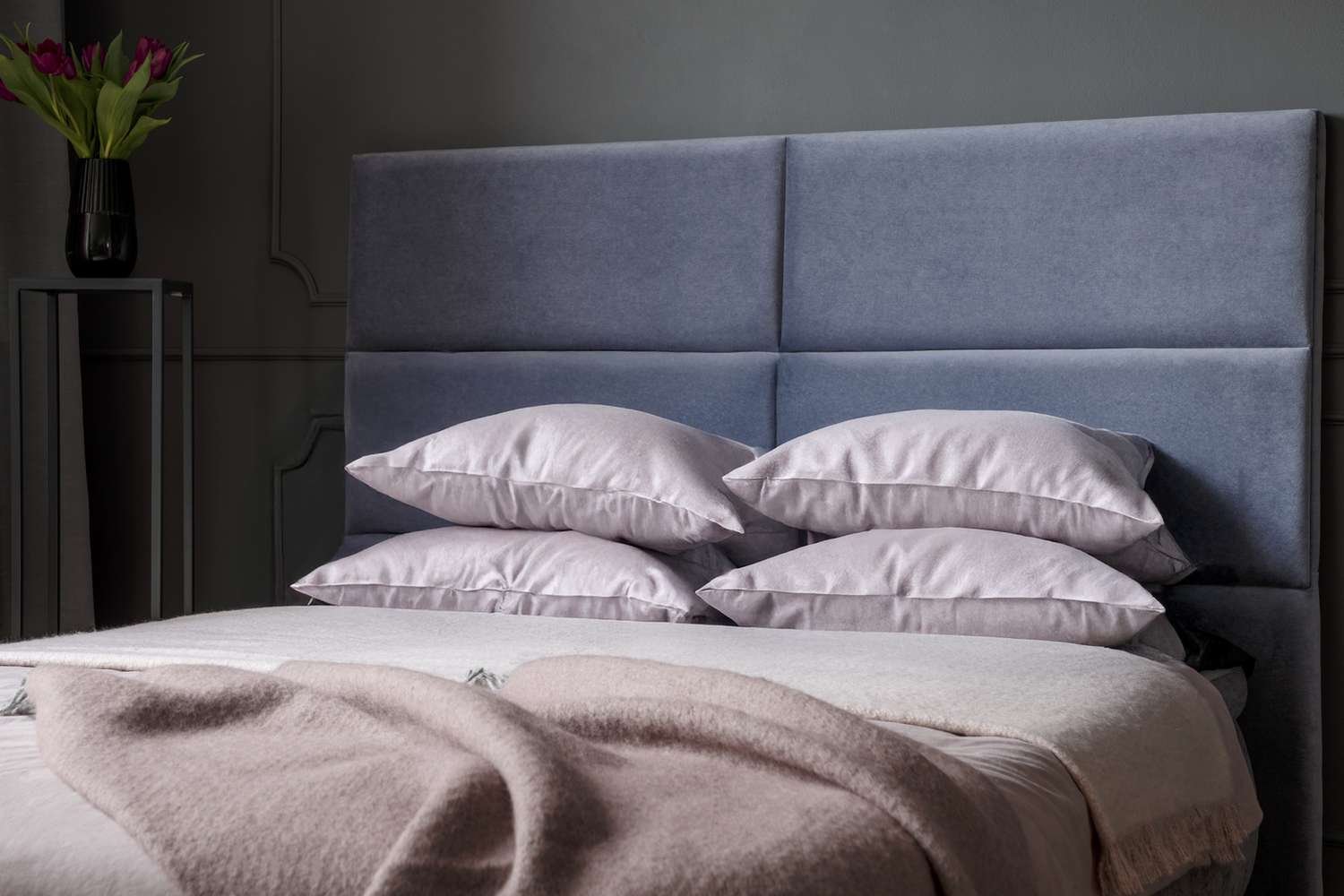 Is It Better to Sleep With One Pillow or Two? Experts Weigh In