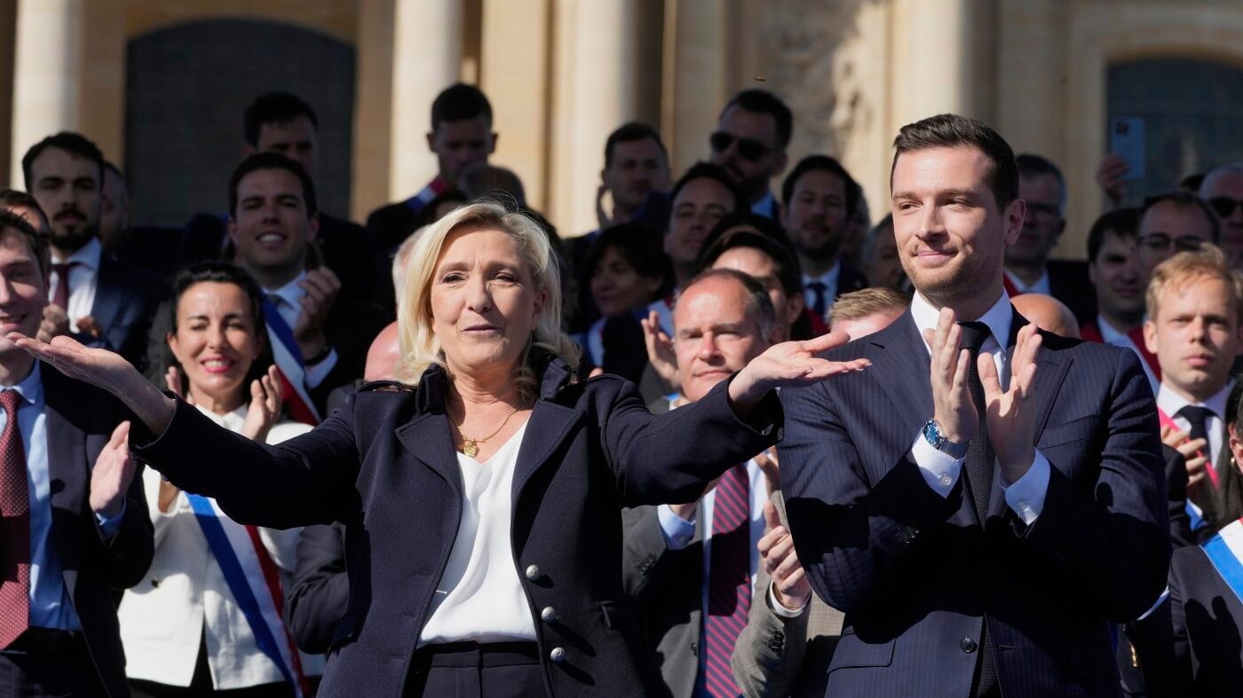 Le Pen supporters rally in Paris, turning a protest into a populist show of force : NPR