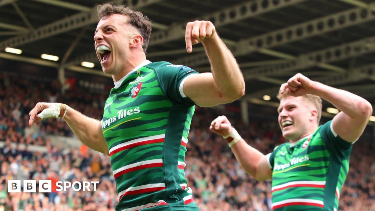 Angus Hall of Saracens scores over Leicester's Adam Radwan
