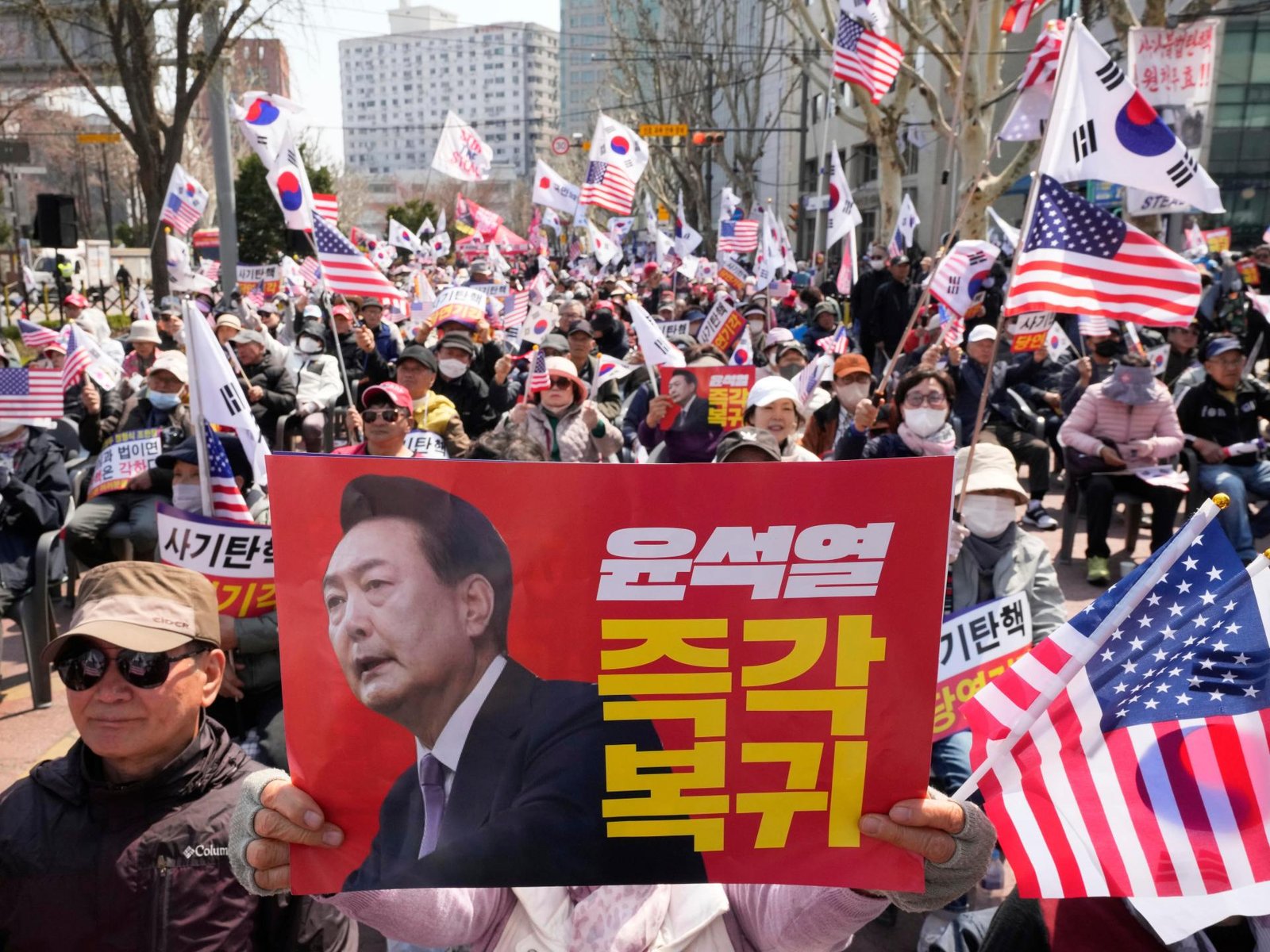 Thousands hit the streets for South Korea’s impeached ex-president Yoon | Protests News