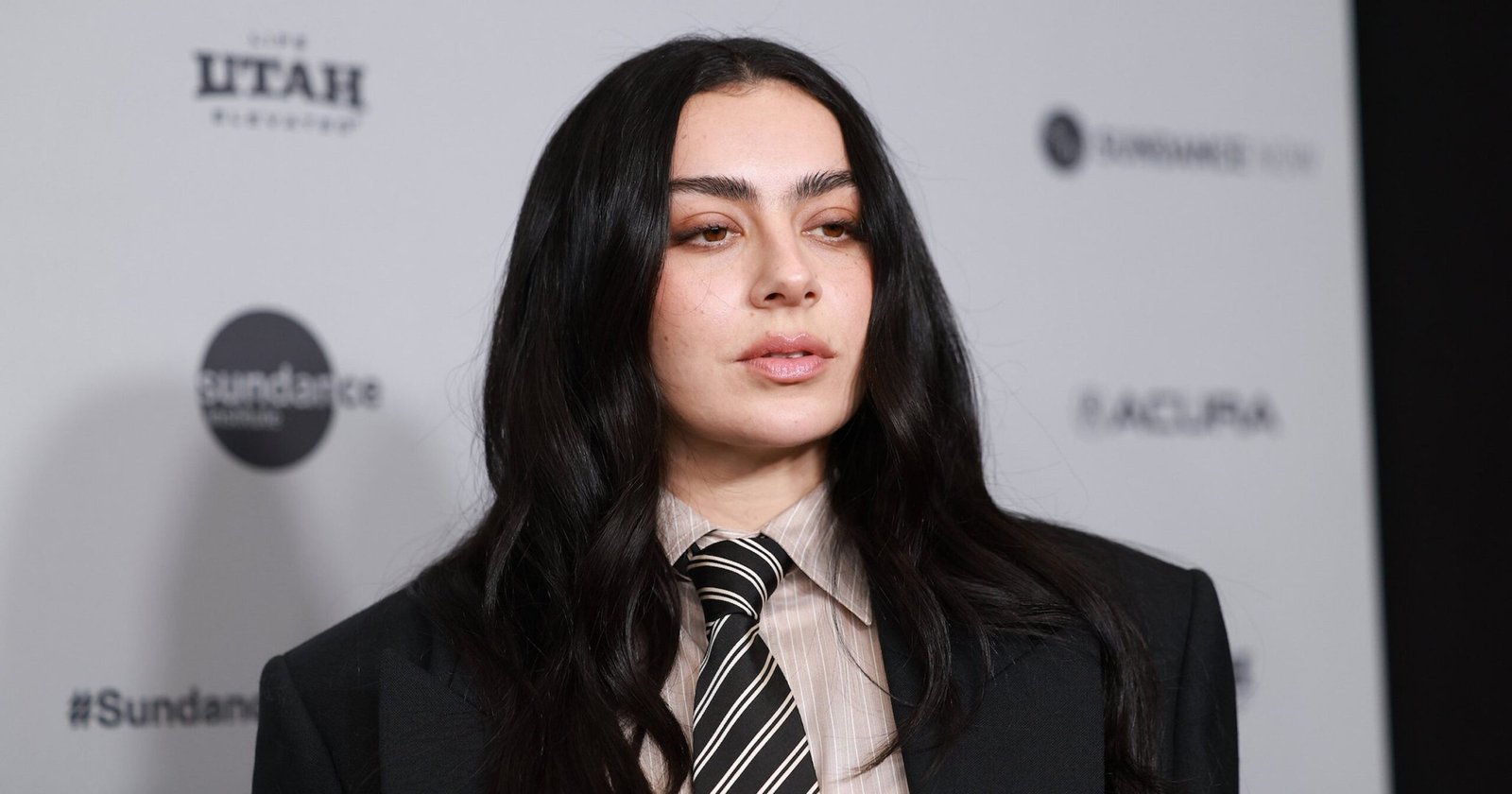 How Real Is Charli XCX Being In 'The Moment'?