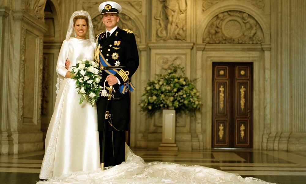 King Willem-Alexander and Queen Maxima on their wedding day. Queen Maxima is in Valentino