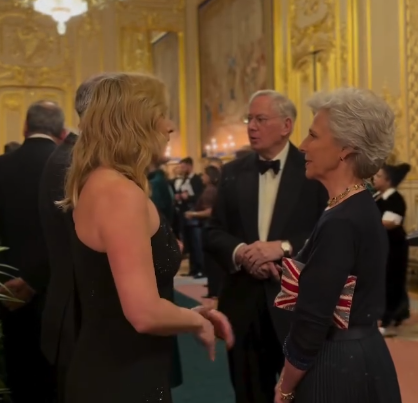 The Duchess of Gloucester carries a Union Jack handbag