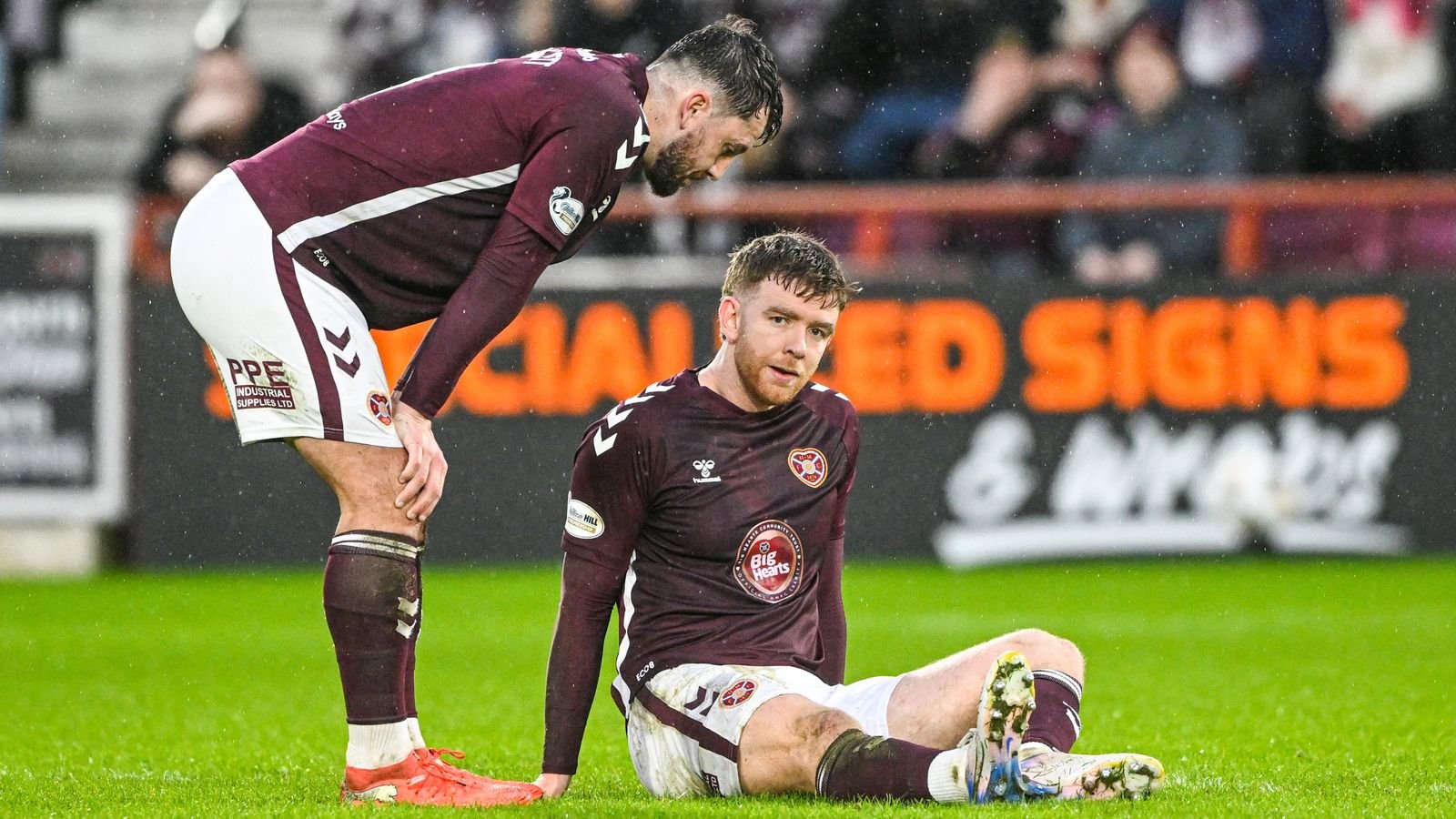 Stuart Findlay receiving treatment after picking up an injury against Falkirk.
