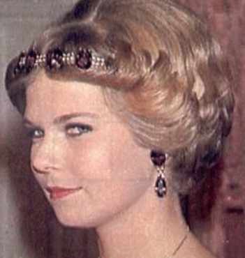 A princess wears an unusual amethyst and pearl tiara