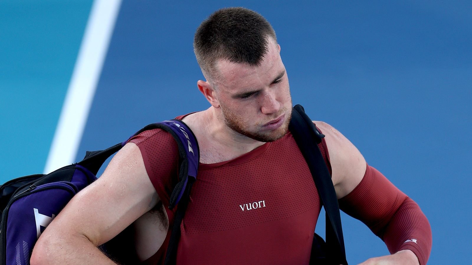 Jack Draper of Great Britain leaves the court after losing to Reilly Opelka of the United States on Day 4 of the Miami Open Presented by Ita
