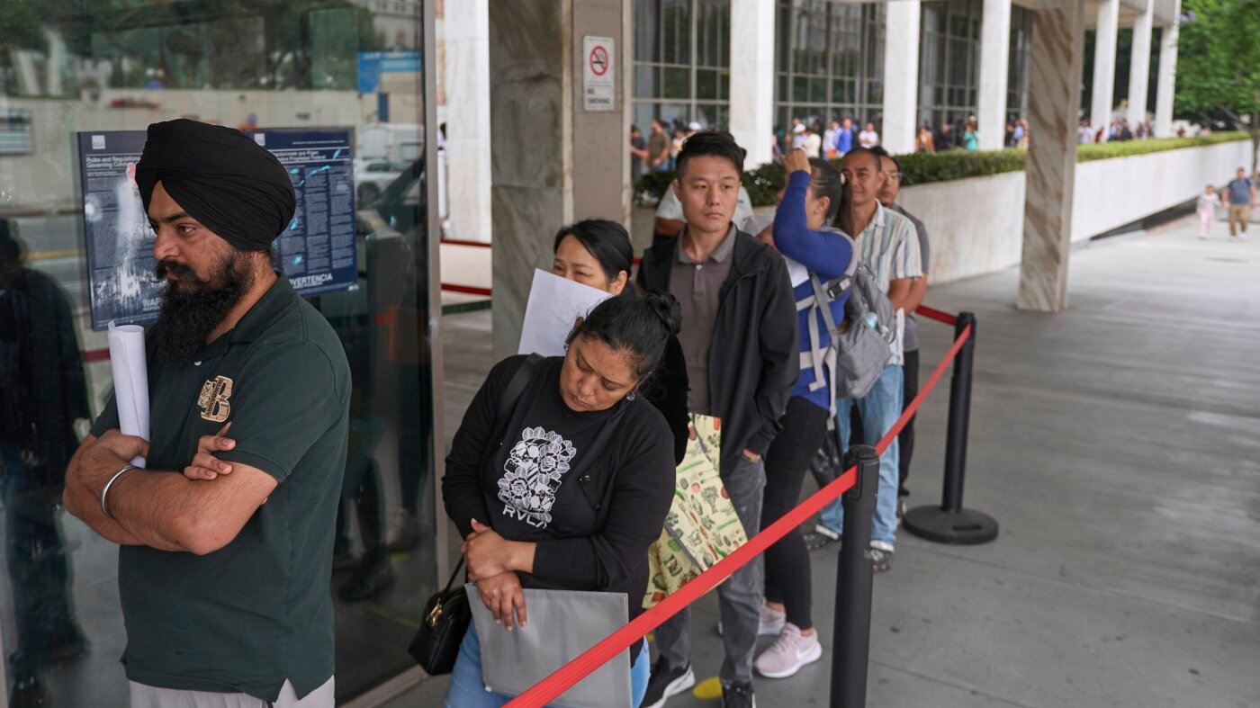 Growing backlog in immigration applications, NPR analysis shows : NPR