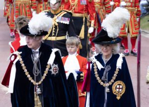 King Charles gives out one of the highest honours to three people
