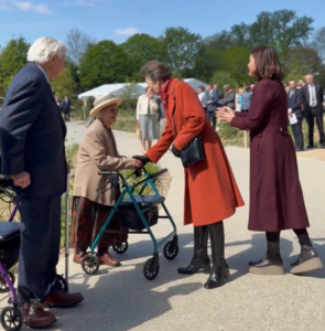 Princess Anne wears an orange coat