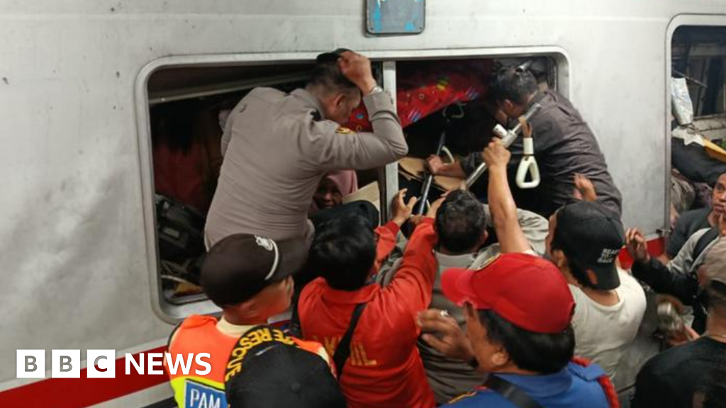 Rescuers race to free survivors trapped inside train after fatal crash