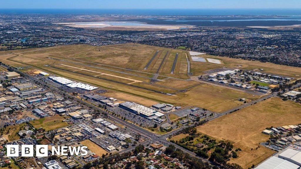 Two dead after small plane crashes into Australia airport hangar