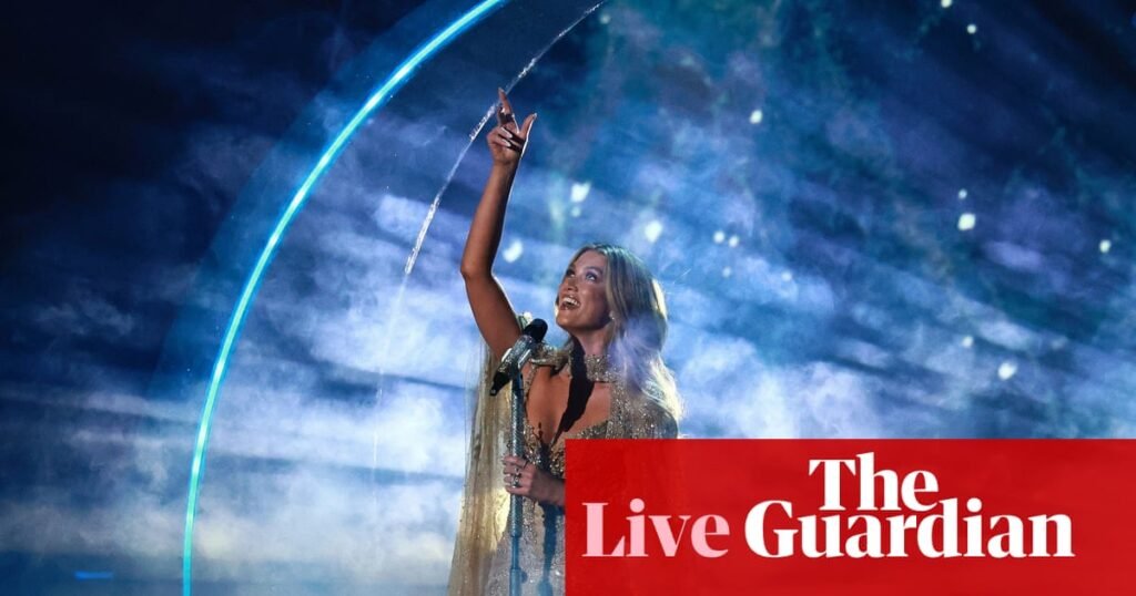 Australia news live: Delta Goodrem hits the stage in Eurovision semi; Angus Taylor accused of ‘dog whistle’ budget reply | Australia news