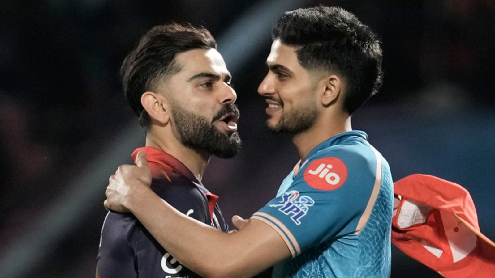 Royal Challengers Bengaluru's Virat Kohli, left, and Gujarat Titans' captain Shubman Gill greet each other at the end of the Indian Premier League cricket match between Gujarat Titans and Royal Challengers Bengaluru in Dharamshala, India, Tuesday, May 26, 2026. (AP Photo/Ashwini Bhatia)