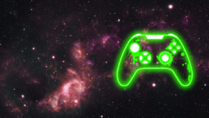 A white video game controller silhouette outlined in neon green with green paint splatters.