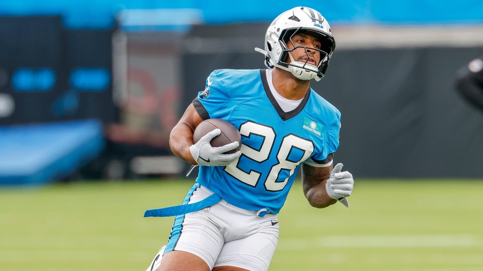 AJ Dillon Rocks Custom Pokémon 'Psyduck' Cleats at Panthers Minicamp in New Photos