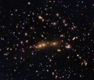 Hubble Glimpses Merging Galaxy Clusters
