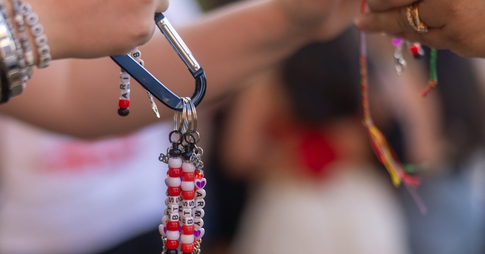 How Freebie Swaps at K-Pop Concerts Lead to Real Friendships