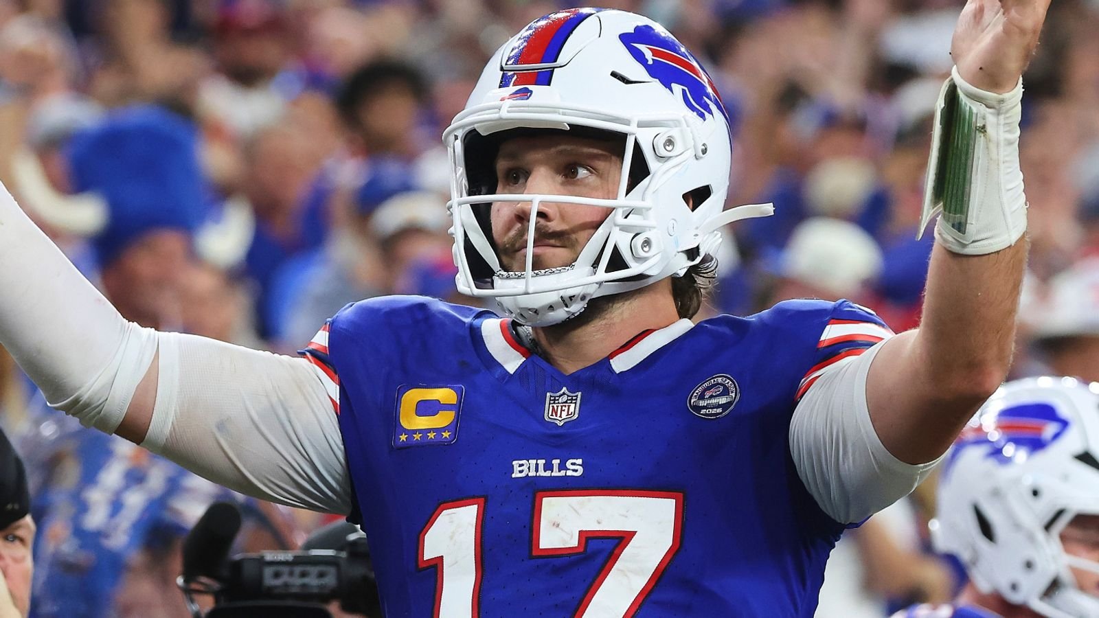 Buffalo Bills quarterback Josh Allen celebrates his rushing touchdown against the Detroit Lions