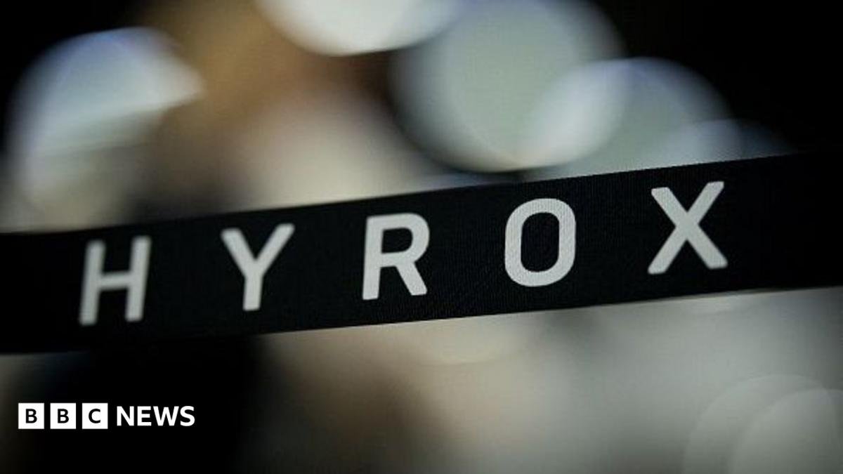 A stock image with a banner showing the name Hyrox over an out-of-focus background.