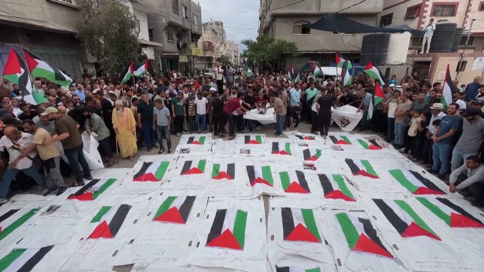 Mourners in Gaza bury remains of loved ones killed in 2023 Israeli strike | Gaza
