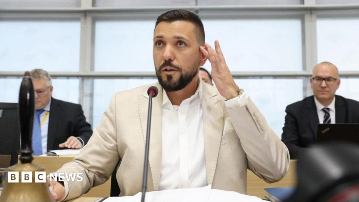 Saxony-Anhalt's newly elected regional parliament speaker Tobias Rausch sits in his chair during the parliament's constitutional session in Magdeburg